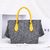 Gray cashmere with yellow ostrich leather flap tote