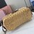 Woven fabric handbag with leather trim