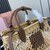 Woven fabric handbag with leather trim