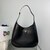 Large leather shoulder bag with topstitching