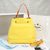 Yellow leather with red edge bucket bag