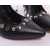 Black leather rivet pump