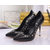 Black leather rivet pump