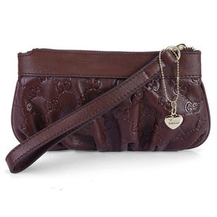 Brown GG Embossed Leather Wristlet with Metal Heart Charm