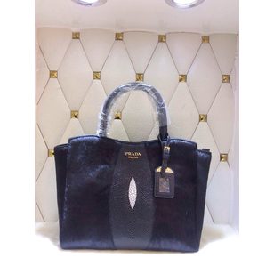 Calf hair leather handle bag