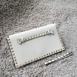 Original leather rivet classic clutch