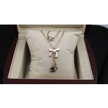 Chanel Rose Gold Bow-tie Charm with NO.5 Logo