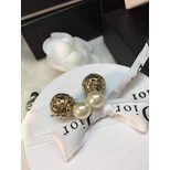 Chanel Pearl cut-out ball earrings