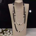 Chanel Black and white pearls long necklace