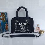 Chanel Mini canvas handle bag with chain shoulder strap